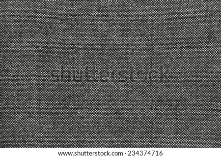 the textured pure background grained fabric with specks of black color