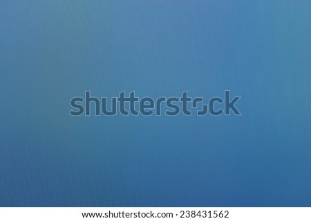 the abstract textured display background from pixels of blue color