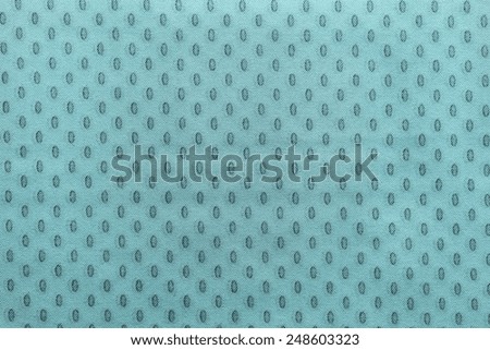 texture of pale turquoise fabric with repeating spots ovals for abstract backgrounds and for wallpaper