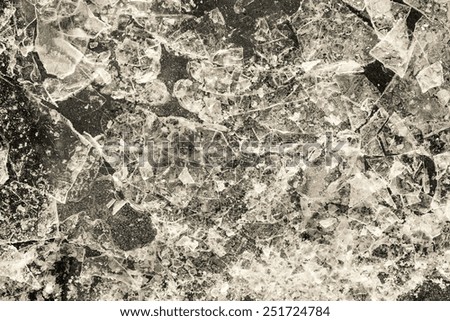 the broken ice textured surface of the frozen water for empty abstract backgrounds of beige color