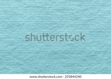 abstract texture of wadded fabric of turquoise color for empty and pure backgrounds
