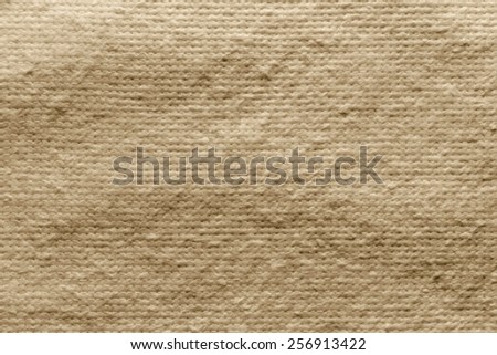 texture of quilted textile batting of sand color for pure and empty backgrounds