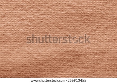 texture of quilted textile batting of coral color for pure and empty backgrounds