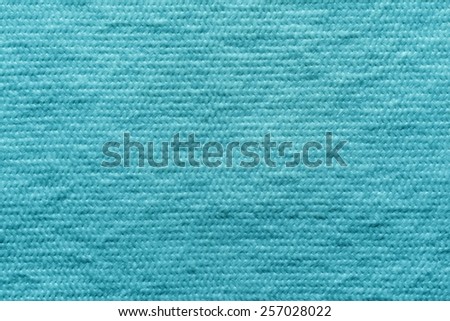 abstract texture of wadded fabric of azure color for empty and pure backgrounds