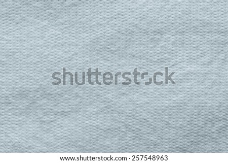 abstract texture of wadded fabric of silvery-blue color for empty and pure backgrounds