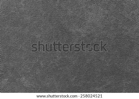 abstract grained texture of textile fabric of black color for empty and pure backgrounds