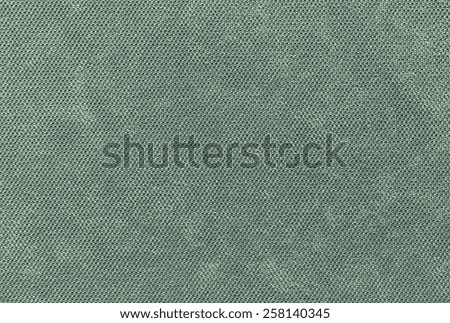 abstract grained texture of textile fabric of pale green color for empty and pure backgrounds