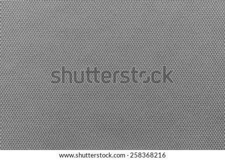 abstract interlacing texture of textile fabric of dark gray color for empty and pure backgrounds