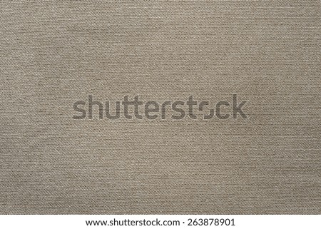 the connected texture of textile fabric of cream color for empty and pure backgrounds with an abstract and confused interlacing of threads