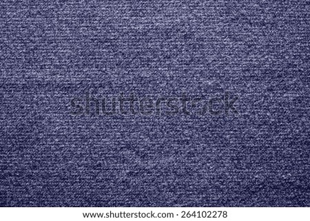 abstract textile texture of felt fabric with tinted stains of violet color for empty and pure backgrounds