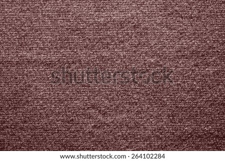 abstract textile texture of felt fabric with tinted stains of claret color for empty and pure backgrounds