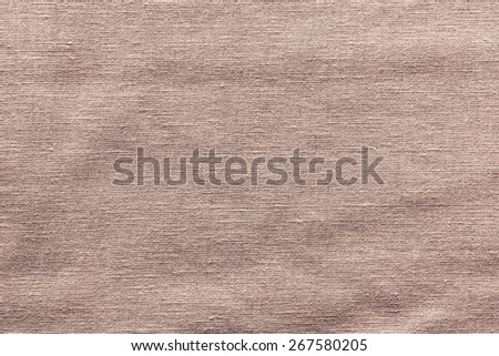 rough woven abstract texture of textile fabric of brown color for empty and pure backgrounds