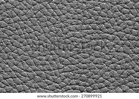 abstract texture of friable leather of black color for the textured empty and pure backgrounds