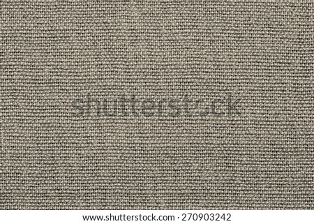 grained texture of textile rough fabric of beige color for empty and pure backgrounds