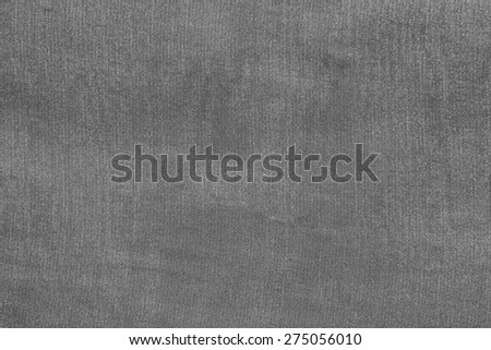 grained texture of textile fabric of pale gray color for empty and pure backgrounds