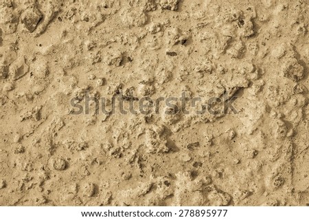rough texture of a concrete surface for empty and pure abstract backgrounds of color sand