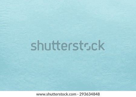 texture of old paper of pale blue color for empty and pure backgrounds