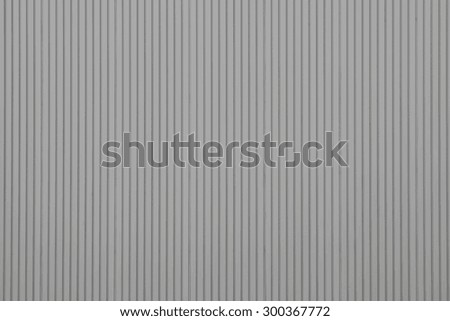 gray color channeled texture of a surface of an iron wall for empty and pure backgrounds and for wallpaper