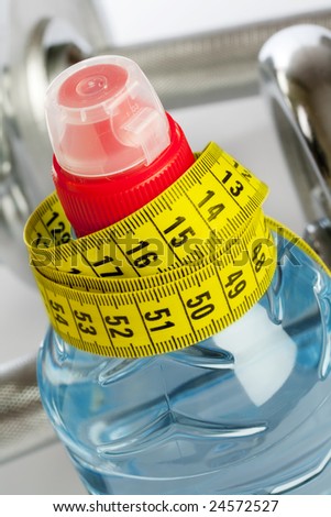 water bottle with measuring tape