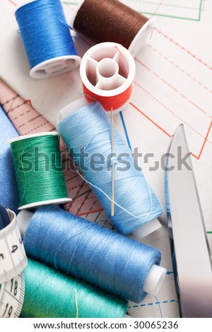 colorful threads on sewing pattern