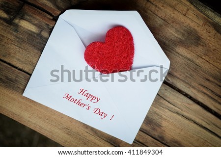 Mothers day. Mothers day card. Mothers day. Mothers day envelope with red heart. Mothers day. Mothers day background and mothers day gift. Mothers day card with copy space. Mothers day.