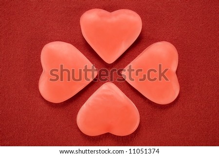 a good-luck four-leaved clover made with heart-shaped candies as leaves