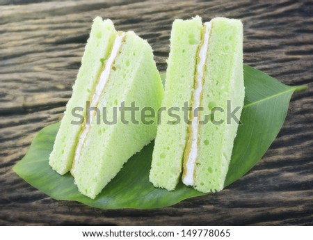 green chiffon cake on a leaf