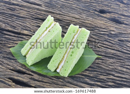 green chiffon cake on a leaf