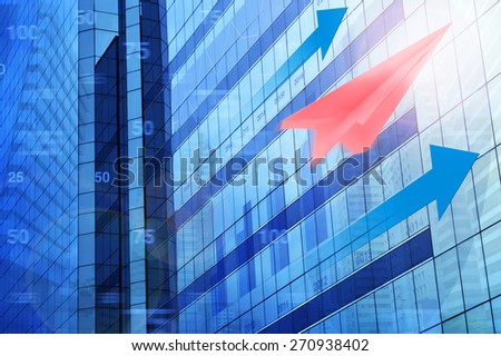 Red plane paper with arrow head and financial chart on tower city, target and win concept