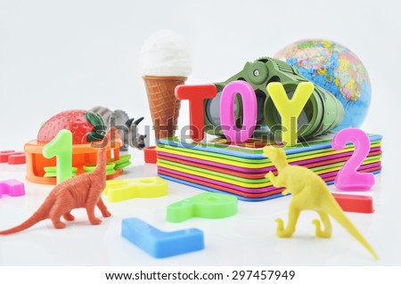 Colorful plastic toys on white background, kid education concept