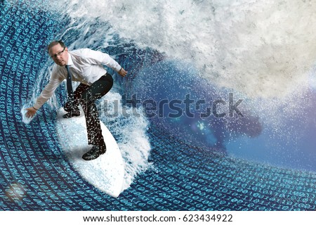 A man is surfing on a digital wave