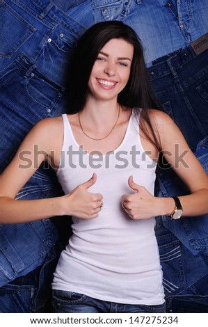 happy girl on a white background in a denim shirt