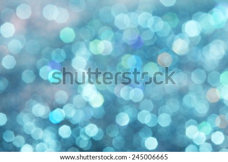 Blue turquoise glitter abstract background Defocused abstract blue christmas winter background Soft lights