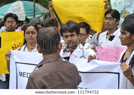 AHMEDABAD, INDIA - SEP 02: Medical students on strike, protesting against an exorbitant fee increase of 100% by the state municipality run medical school on September 02, 2012 in Ahmedabad, India
