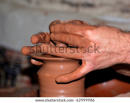 An artisan making terra cotta earthenware on a spinning mud block somewhere in central Turkey