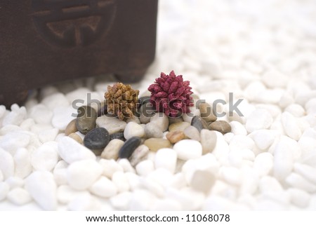 zen colored pebbles on white pebbles oriental meditation concept