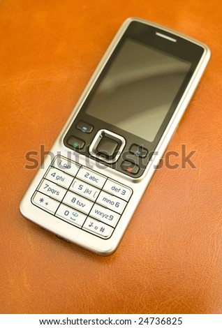 Mobile phone on skin orange agenda