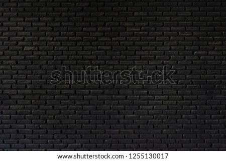 Old black brick wall texture ,brick wall texture for interior design vintage dark tone.