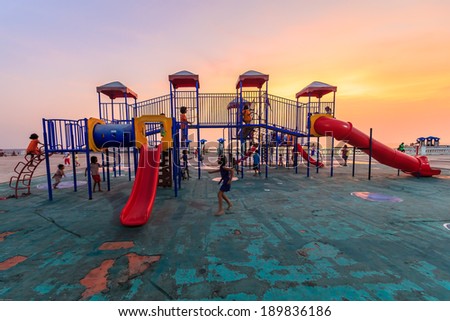 Chonburi - every Saturday and Sunday: families to take their children to run and play on the playground. Playgrounds are a symbol of the city of Chonburi in Thailand on 11 April 2014.
