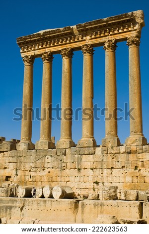 BAALBECK,LEBANON - CIRCA OCTOBER, 2012- Tourist standing near huge column of Roman template at Baalbeck