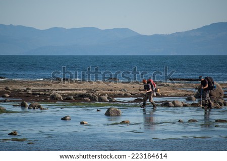 VANCOUVER ISLAND, CANADA -  CIRCA MAY, 2010 - Two hikers on West Coast trail, Canada