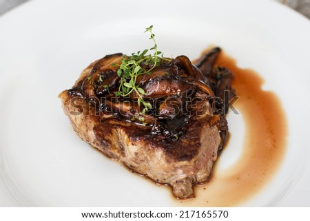 Filet mignon steak with shiitake mushrooms