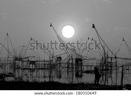 Freshwater fishing in silhouette. , B&W , Black and white