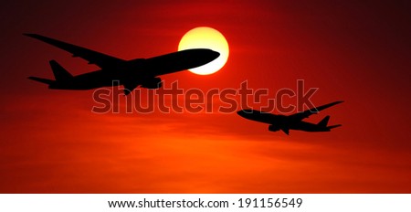 airplanes silhouette in the sun