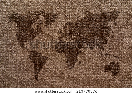 World Map on the brown cloth background.
