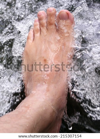 foot in cold water flow