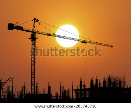 Construction Site silhouette in the sunset background