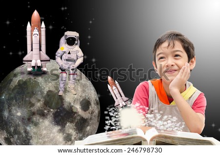 Little boy dreaming  about his future out of space to the moon - \