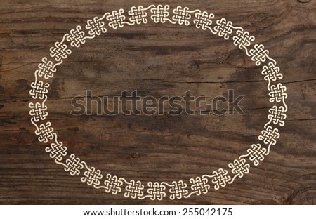 celtic border knotwork ornament old wooden background
