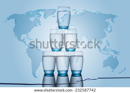 Stack of six Water glasses with water world map